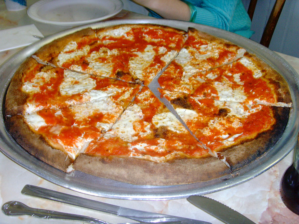 A margarita pie from Totonno's pizza in Coney Island with cheese under the sauce to help keep the crust crisp