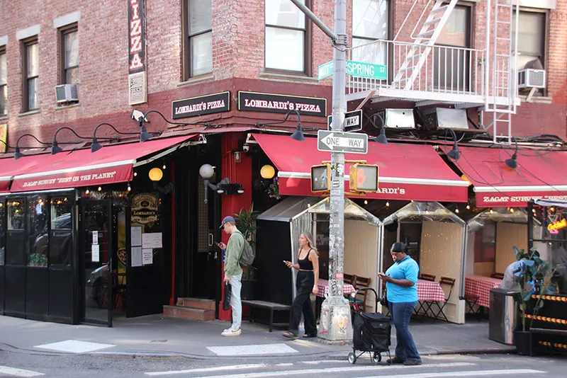 Lombardi's second location at 32 Spring Street is a corner spot. The original location closed in the 1980s. The new owners chose this one because it already had a coal oven