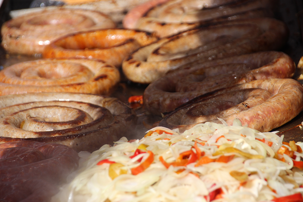 Sausage and peppers on a roll are the classic san gennaro food